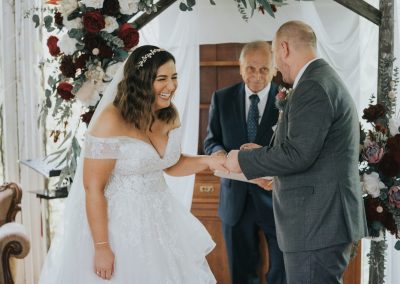 Happy couple getting married by Phil Timbrell, a Blue Mountains wedding celebrant